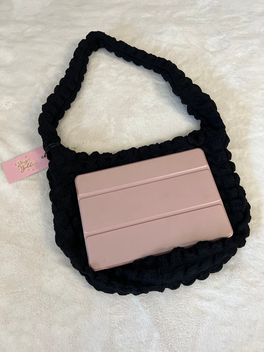 “The Essential Puffer Bag”