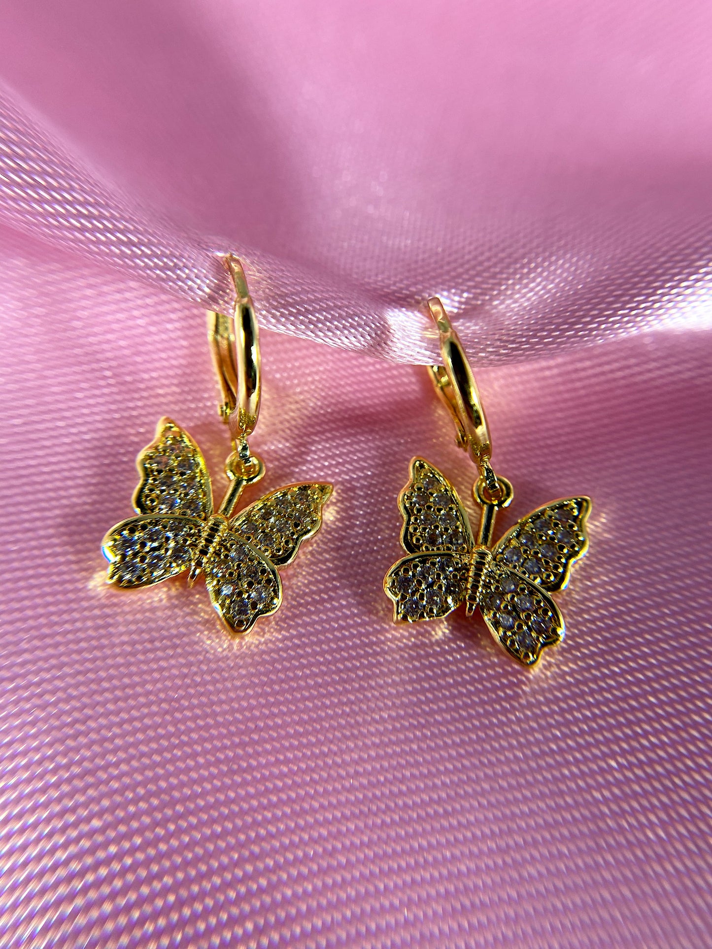 "Bling'd up" butterfly earrings