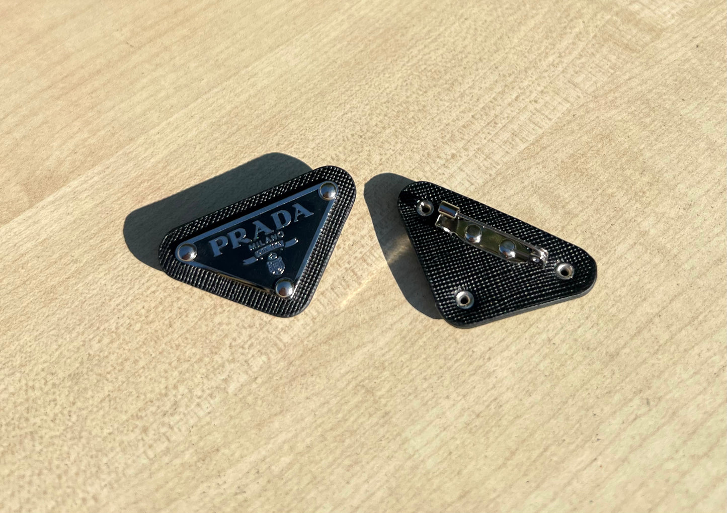 “Prada You” pin